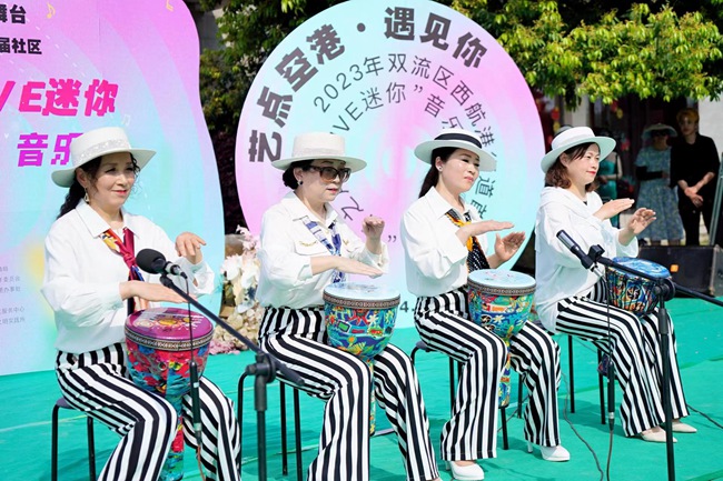 西航港滨河公园举办首届社区音乐节“春之声·LIVE迷你”活动。刘贤虎供图