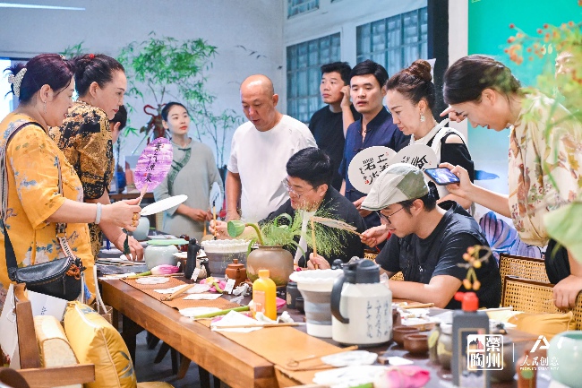 活动现场照片。 人民创意供图