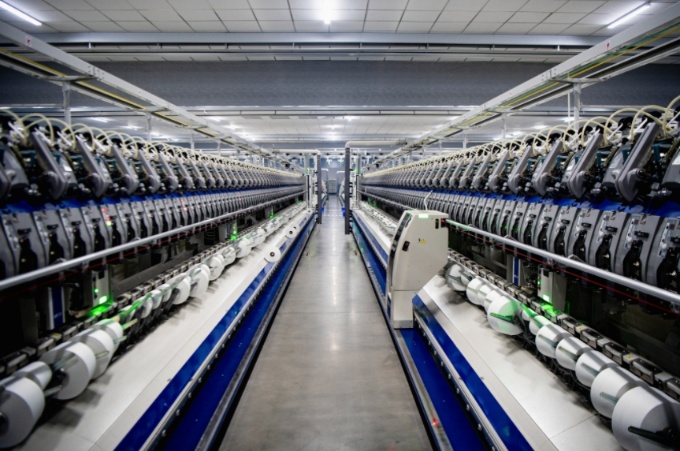 帛宇年产26万锭绿色生态智能纺纱项目车间。井研县委宣传部供图
