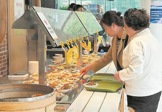 社区食堂吃饭 刷社保卡满5元立减4.99元