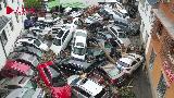直击汶川“8.20”强降雨洪灾：耿达镇龙潭村近百辆轿车被冲毁
